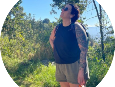 Student is standing in nature